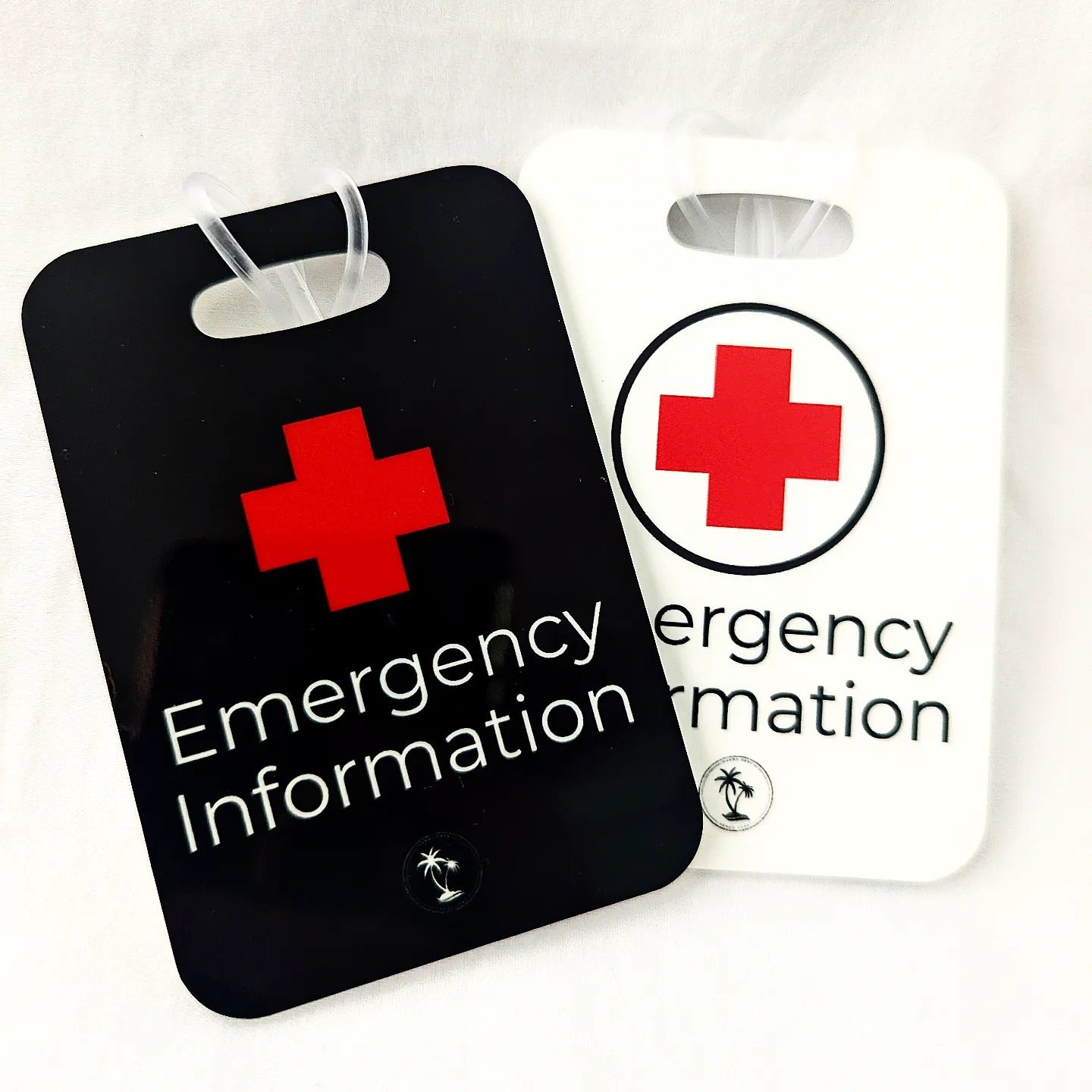 Focused photograph of Hands Here Emergency Information Tags showing black and white designs