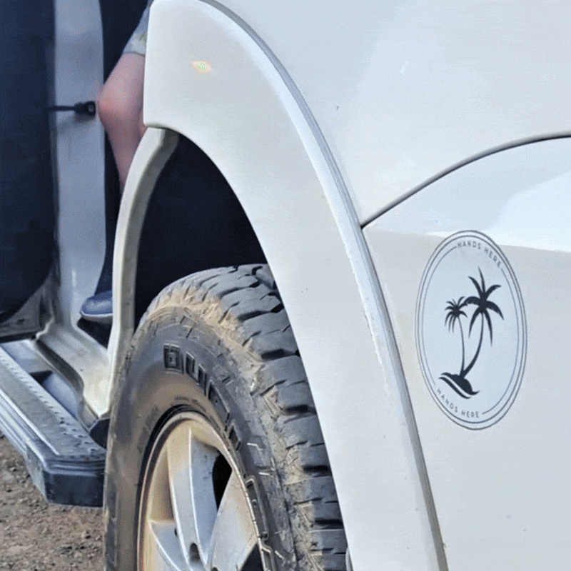 Hands Here Decal and safety magnet demonstration showing real-world use on family vehicle