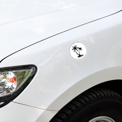 White Hands Here Palm decal or magnet design on front panel of white car showing placement on vehicle