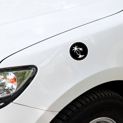 Black Hands Here Palm decal or magnet design on front panel of white car showing placement on vehicle
